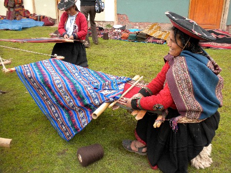 Chinchero weaver covers her warp