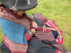 Weaving the border on a finished shawl