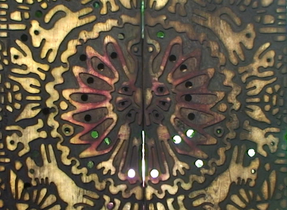 Design carved into two redwood boards