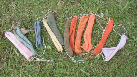 Mushroom-dyed knitted squares