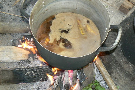 ><i>Nangben</i> wood pieces boiling on the fire