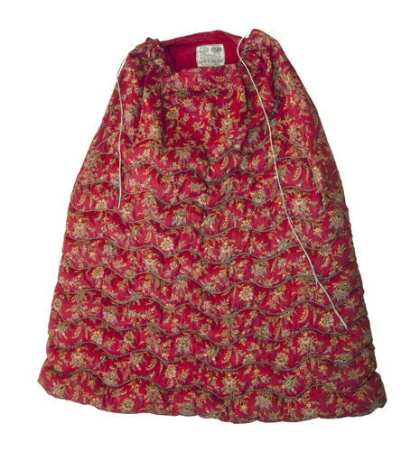 A Turkey red dyed and printed, quilted petticoat