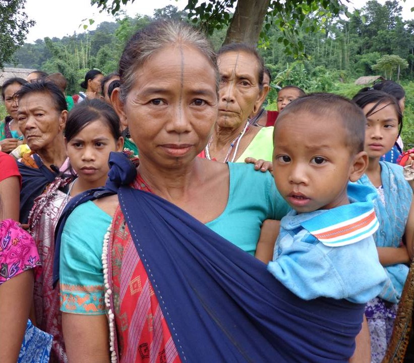 Karbi women, Assam, showing their duk or facial tattoo