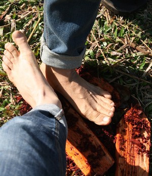 Rubbing our feet on the hot spent dye/mordant material