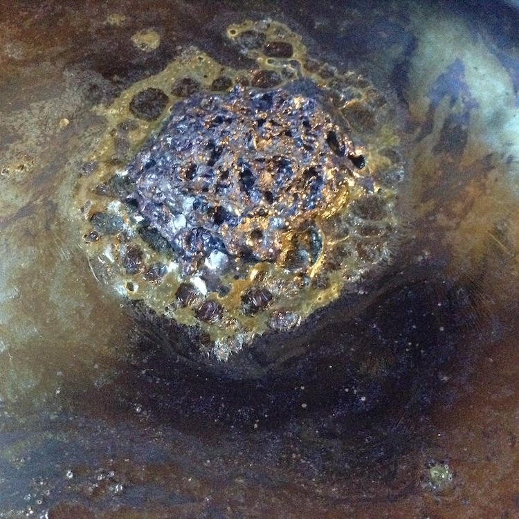 A copper sheen on the surface of a new indigo vat is a sign that things are starting to work