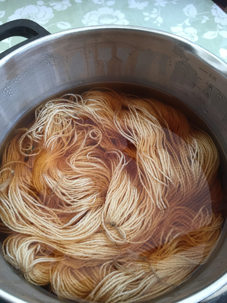 Linen yarn in the scoup pot after 2 hours of simmering